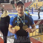 Szűcs Kristóf, nyakában az arany- és a bronzéremmel